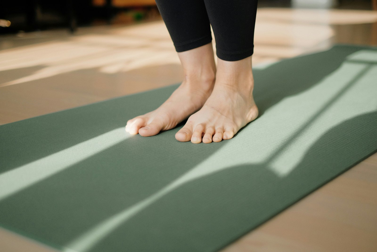 Feet on a pilates mat
